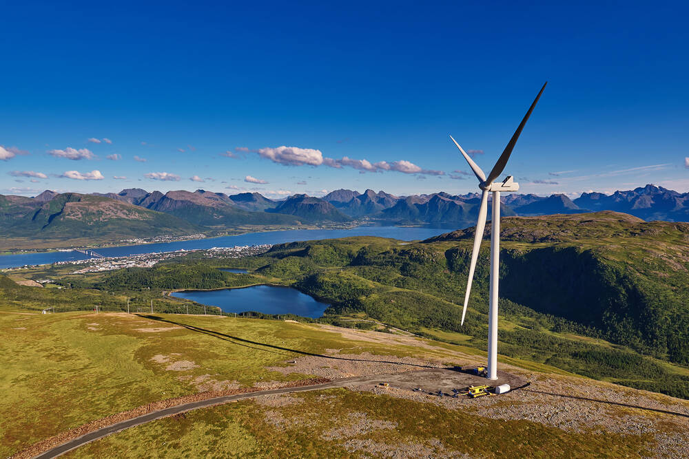Wind turbine in a mountainous landscape