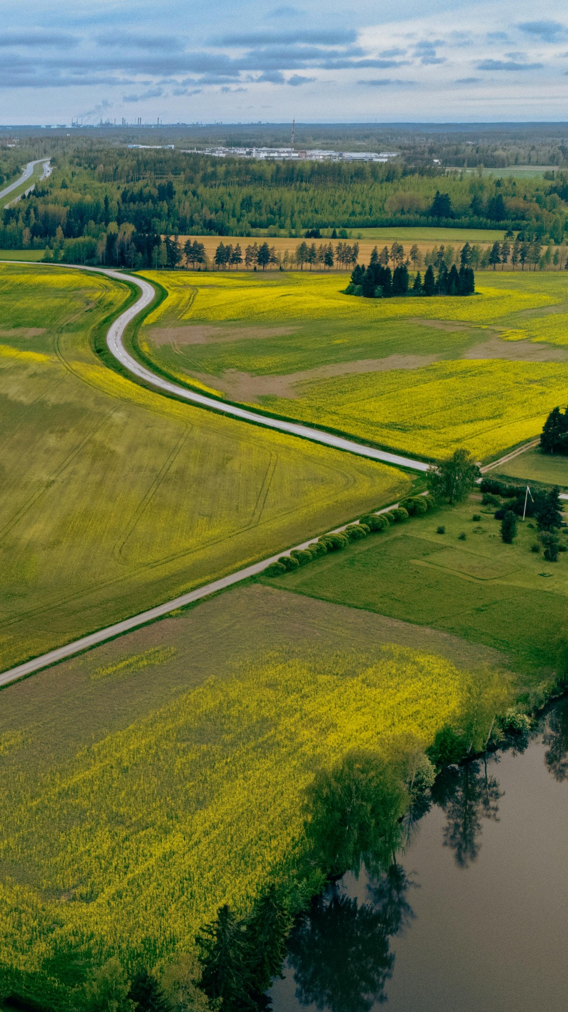 Fields and winding roads in a Finnish rural landscape